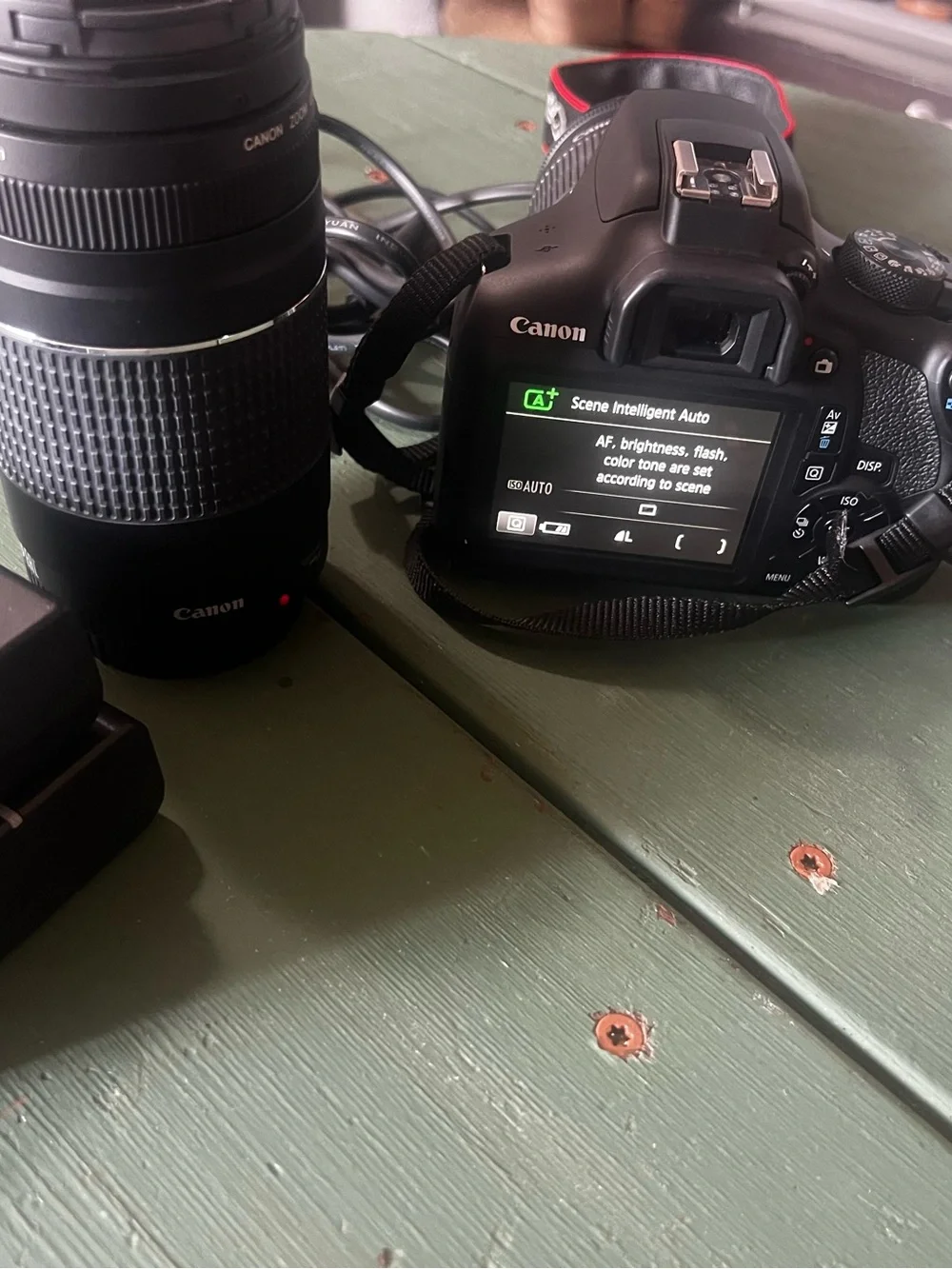 Canon DSLR Camera with Black 18-55mm Kit Lens and Black Telephoto Lens